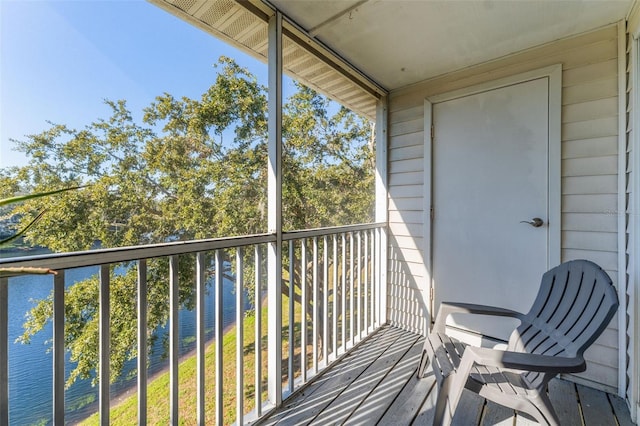 balcony featuring a water view