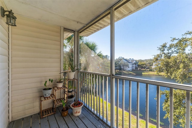 balcony featuring a water view