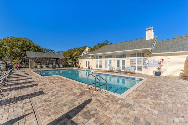 view of swimming pool featuring a patio