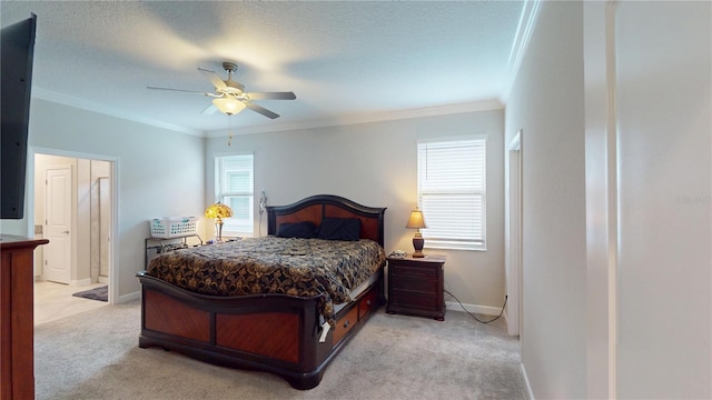 bedroom with crown molding, ensuite bath, light carpet, and a textured ceiling