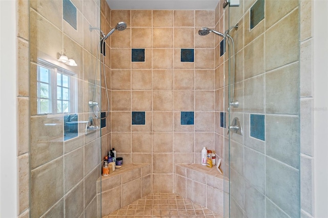 bathroom with tiled shower