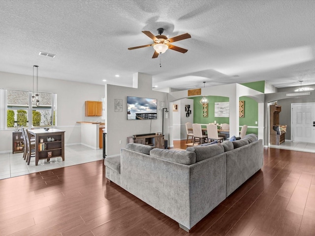 living room with ceiling fan