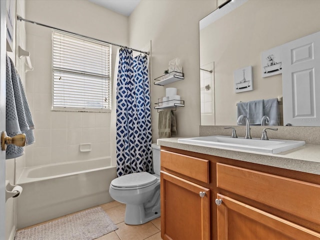 full bathroom featuring tile patterned flooring, vanity, toilet, and shower / bath combo with shower curtain