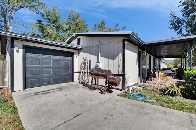 view of side of property featuring a garage