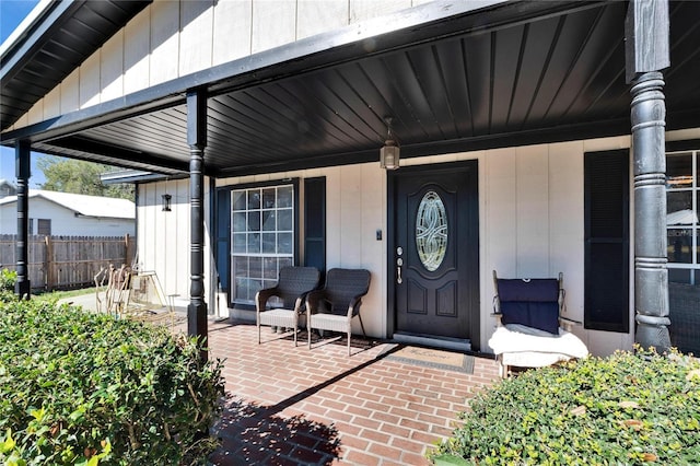 doorway to property with covered porch