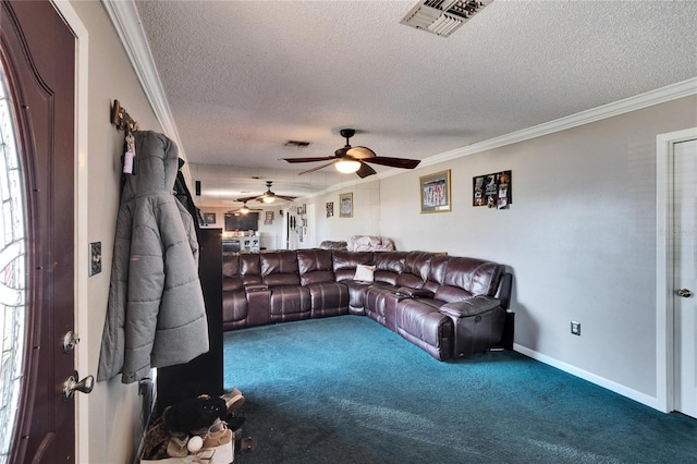 living room with crown molding, ceiling fan, carpet, and a textured ceiling