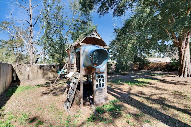 view of outdoor structure featuring a playground