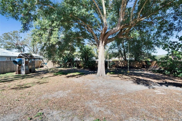 view of yard with a playground