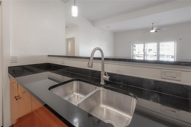 kitchen with sink and hanging light fixtures