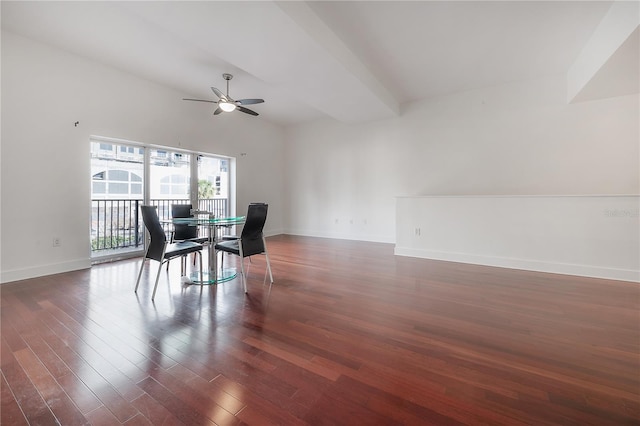 dining area with ceiling fan and dark hardwood / wood-style flooring