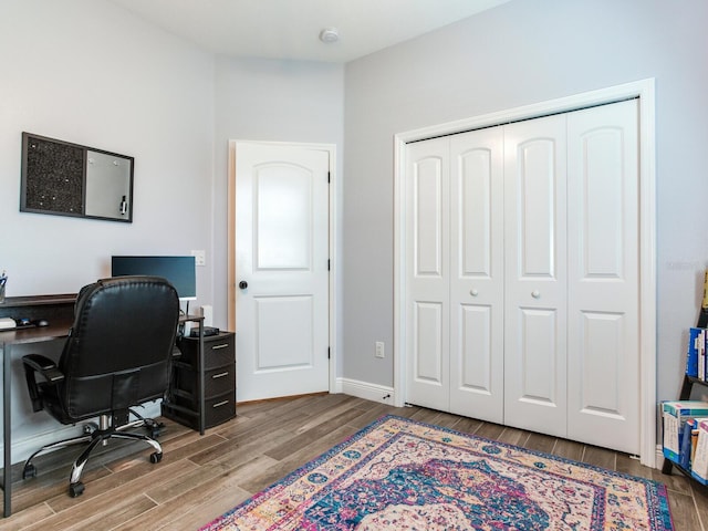 office with hardwood / wood-style floors