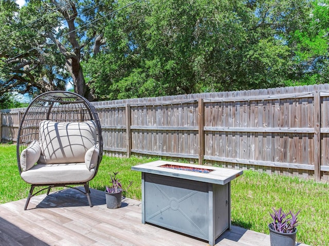 deck with a fire pit