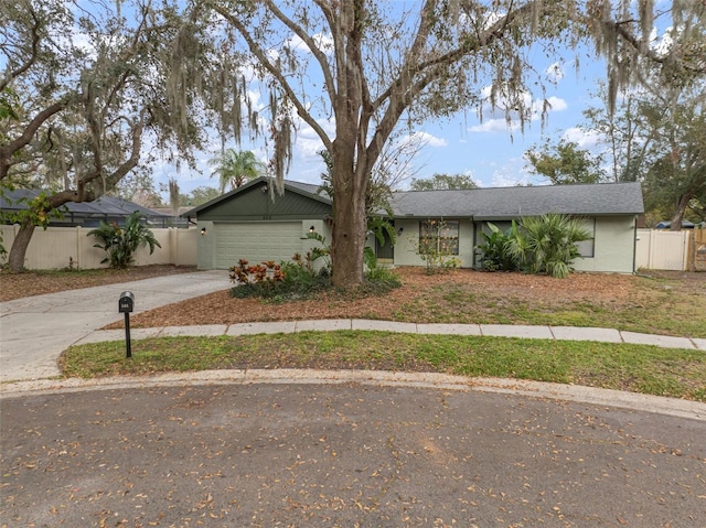 ranch-style home with a garage