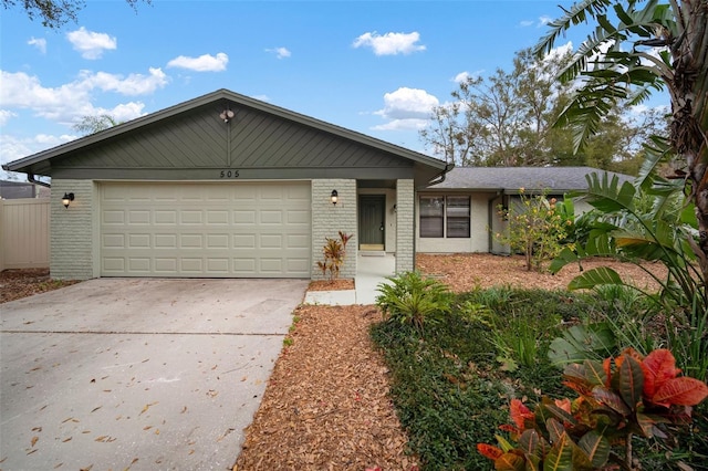 ranch-style home featuring a garage