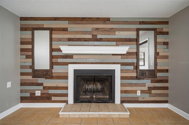 details with wooden walls and a textured ceiling