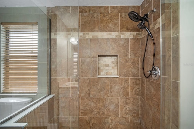 bathroom with tiled shower