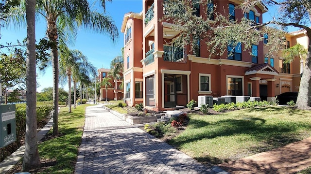 view of property featuring central air condition unit