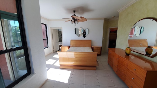 tiled bedroom featuring crown molding and ceiling fan