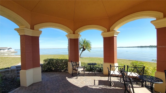 view of patio / terrace featuring a water view