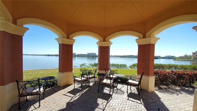 view of patio / terrace featuring a water view