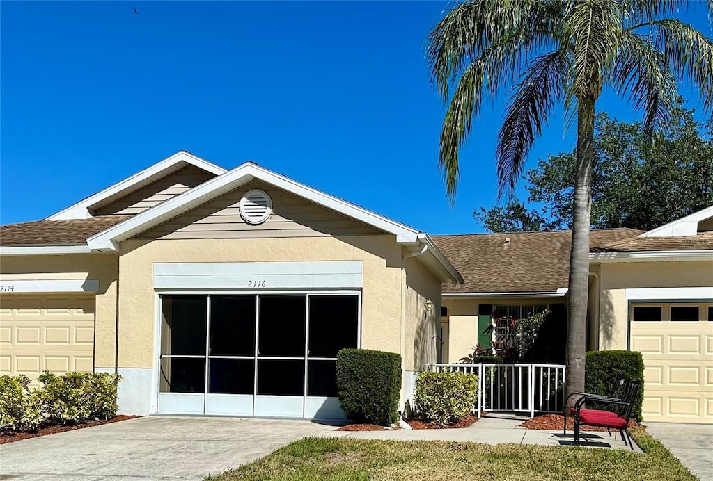 exterior space featuring a garage and a porch