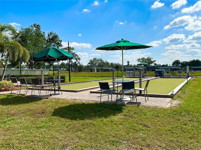 2116 Nantucket Dr Unit 19, Sun City Center, FL 33573 - view of community featuring a lawn and fence