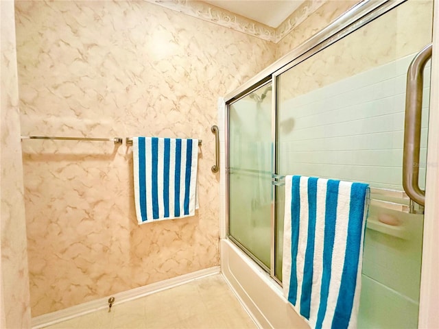 2116 Nantucket Dr Unit 19, Sun City Center, FL 33573 - full bathroom featuring baseboards and enclosed tub / shower combo