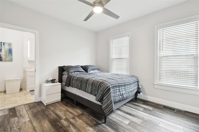 bedroom with hardwood / wood-style flooring and ceiling fan