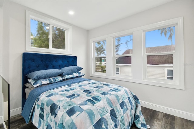 bedroom featuring dark wood-type flooring