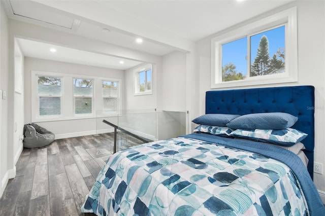 bedroom featuring dark hardwood / wood-style flooring