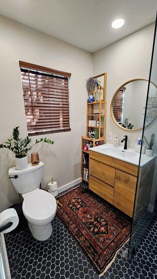 bathroom with vanity and toilet