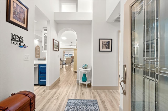 corridor featuring light hardwood / wood-style floors