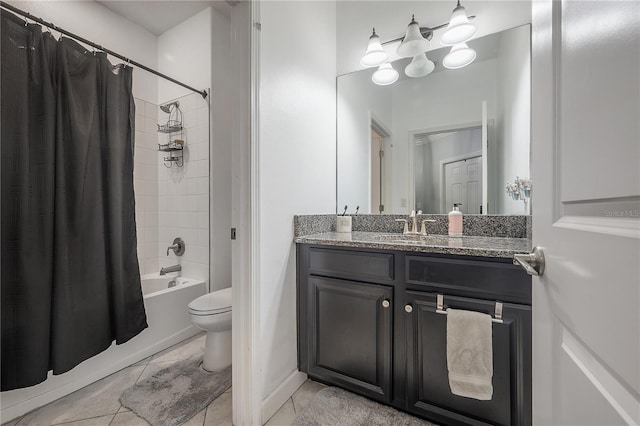 full bathroom featuring tile patterned floors, toilet, shower / bath combo with shower curtain, and vanity