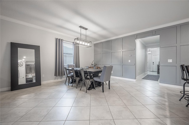 tiled dining space featuring ornamental molding