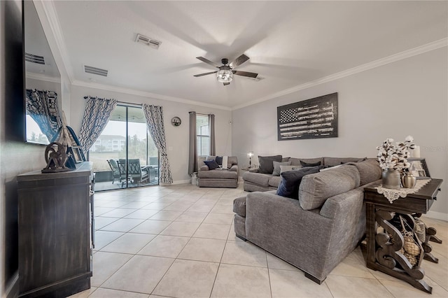 tiled living room with crown molding and ceiling fan