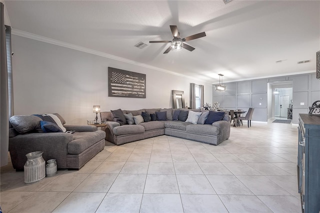 tiled living room featuring crown molding and ceiling fan