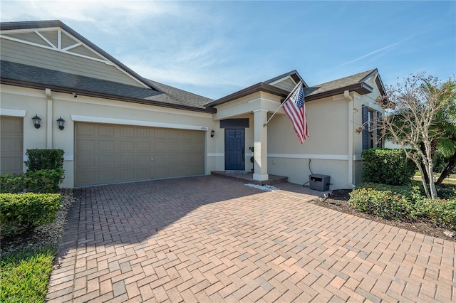 view of front of property featuring a garage