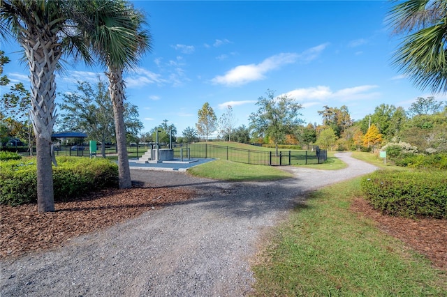 surrounding community featuring a lawn