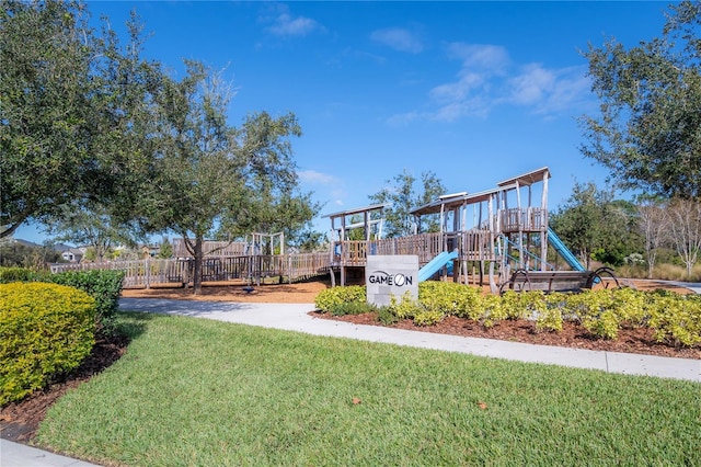 view of jungle gym with a yard