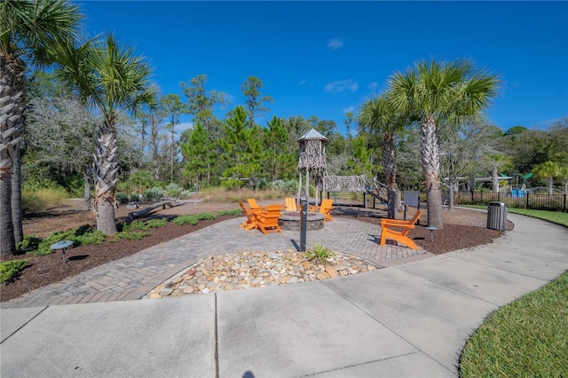 view of patio with an outdoor fire pit