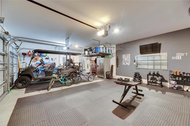 workout area with a textured ceiling