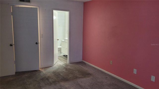 unfurnished bedroom with carpet flooring