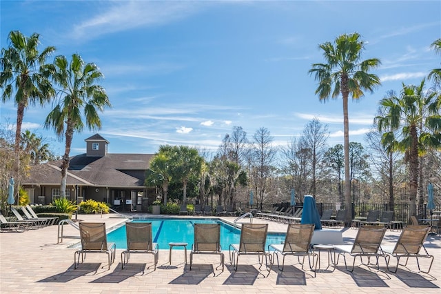 view of swimming pool with a patio area