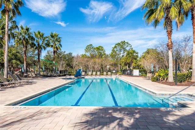 view of pool featuring a patio