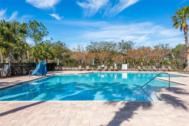 view of swimming pool featuring a patio