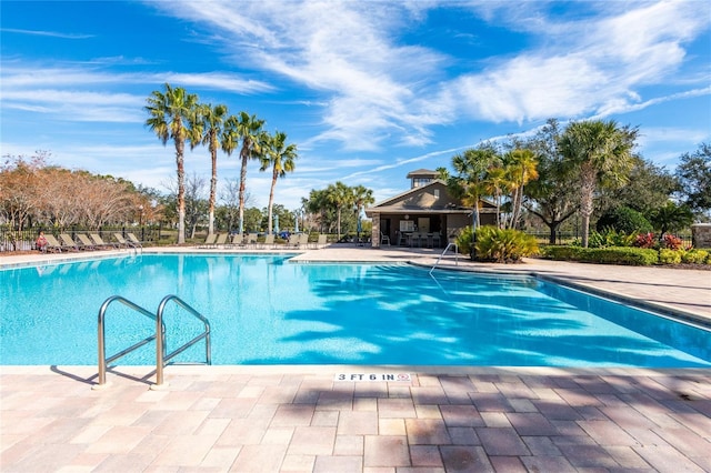 view of pool featuring a patio