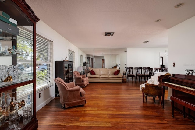 living room featuring dark hardwood / wood-style floors