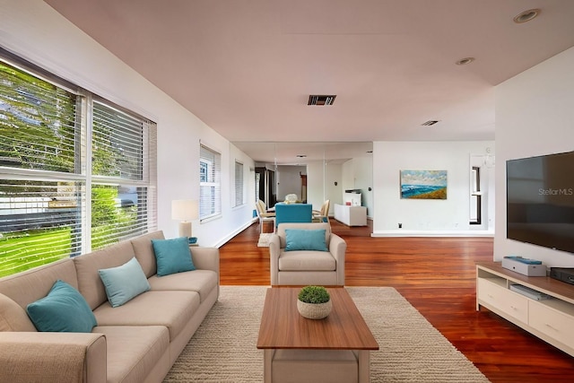 living room featuring dark hardwood / wood-style floors