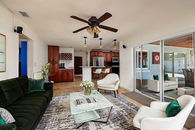 living room featuring ceiling fan