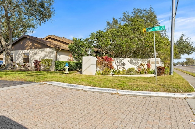 view of front of property with a front lawn